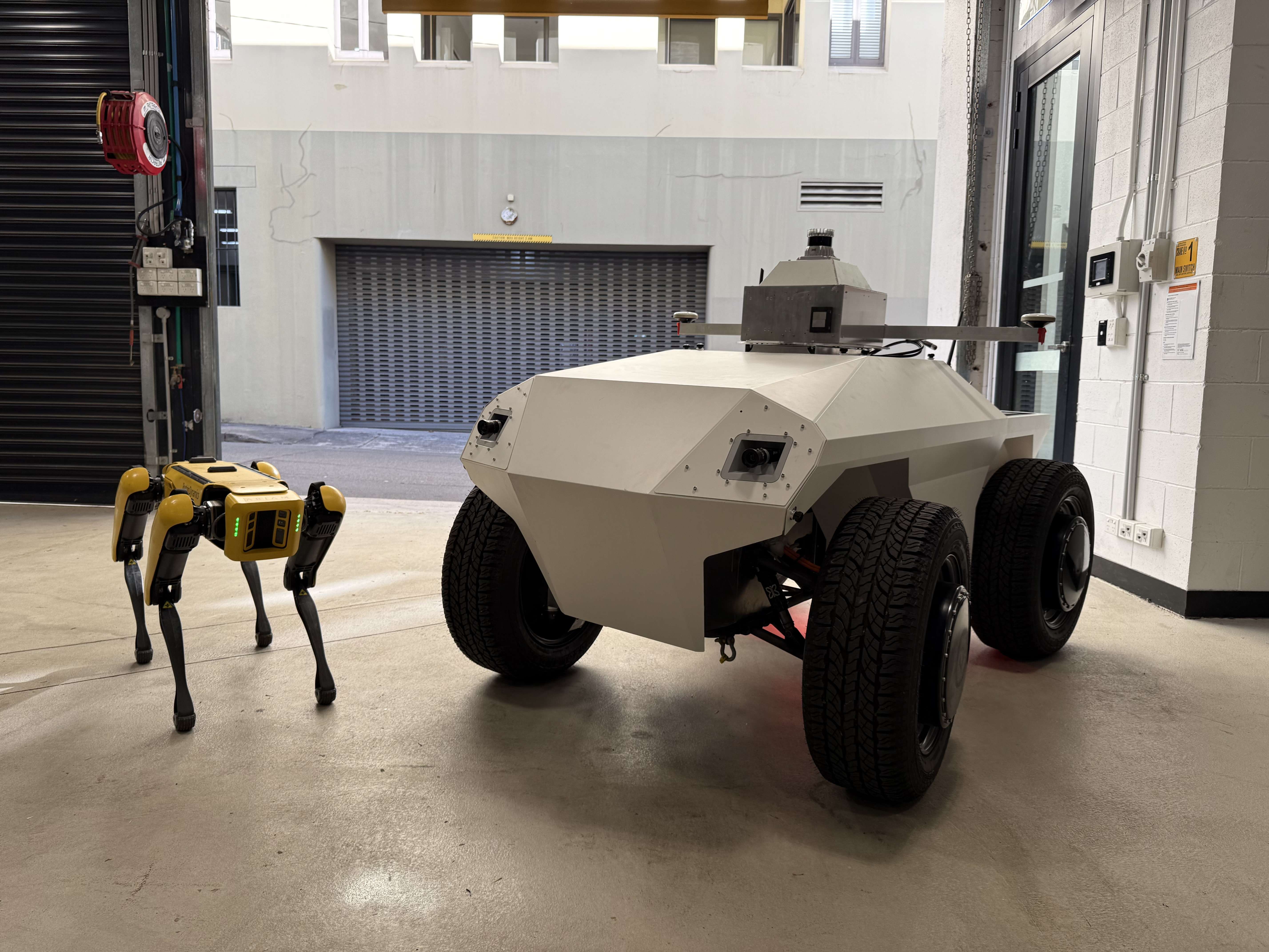 Our Spot and our custom autonomous ground vehicle, Groundhog